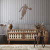 Basketball player sign, copper color, on the wall